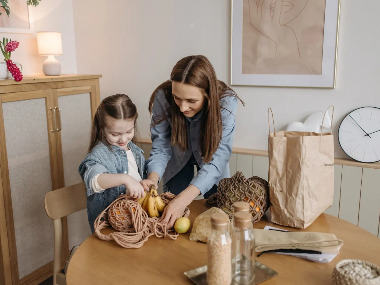 Two children sitting together with a picture book.